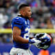 New York Giants running back Saquon Barkley (26) walks onto the field in the second half. The Giants lose to Washington, 22-7, at MetLife Stadium on Sunday, Jan. 9, 2022.